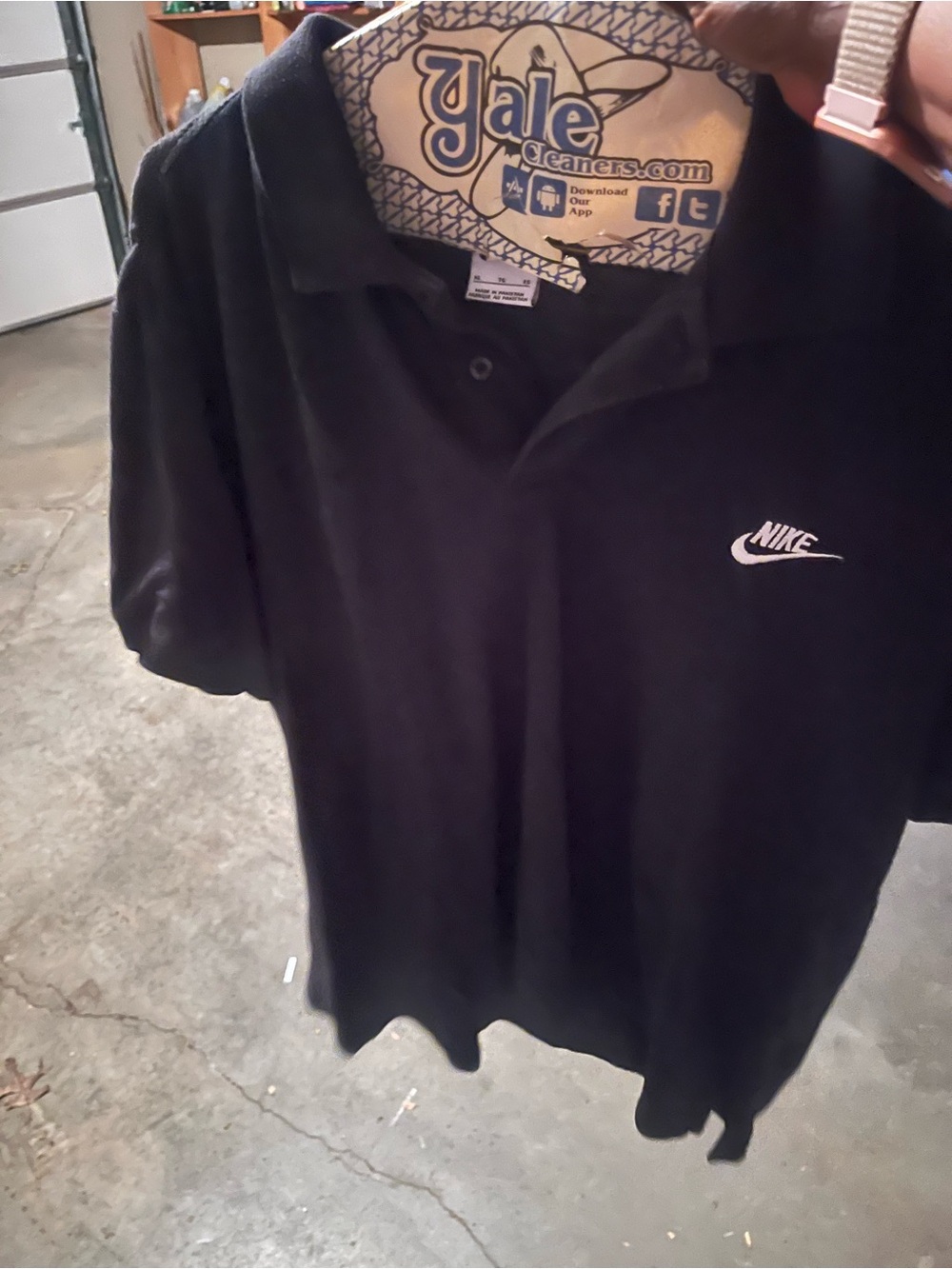Nike Black Polo with White Swoosh Logo